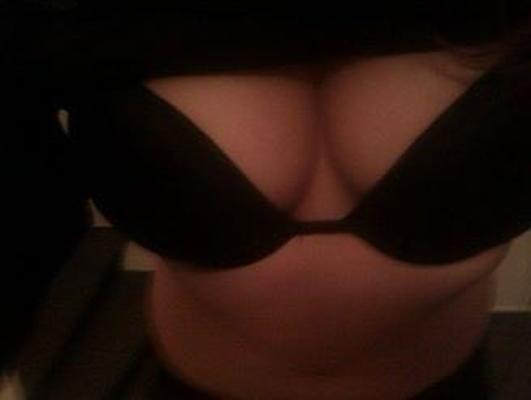 Pretty blond teen girl showing herself