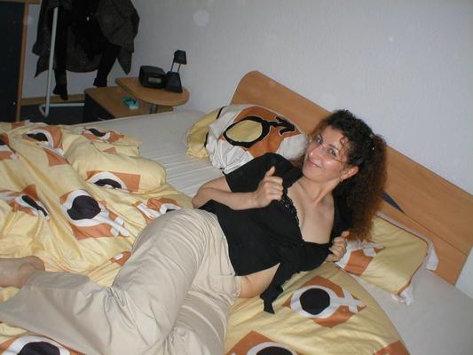 Curly haired young wife flashed